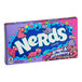 A white box of Nerds candy with a blue and purple design featuring cartoon characters including a pink dinosaur.