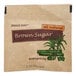 A brown sugar packet with a label featuring text and pictures.