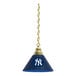 A blue lamp shade with a white New York Yankees logo and brass accents.