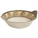 A white melamine bowl with a mosaic swirl design on the border.