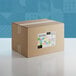 A cardboard box of Adourne Mini Pastel Confetti Sequin Sprinkles with a label.