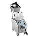 A Goodway commercial vapor steam cleaner with a cart and a bucket of liquid.