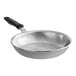 A Vollrath Wear-Ever aluminum frying pan with a black silicone handle.