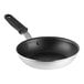 A close-up of a Vollrath Wear-Ever aluminum non-stick frying pan with a black handle.