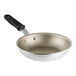 A Vollrath Wear-Ever aluminum non-stick fry pan with a black silicone handle.