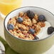 A bowl of Nature Valley granola with berries and yogurt.