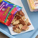 A table with a tray of Annie's Organic Bunny Grahams and a bag of bunny crackers.