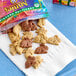A white bag of Annie's Organic Friends Mixed Bunny Grahams cookies with a bunny on it.