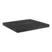 A black plastic grid platform panel.