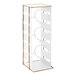 A white metal rack with three gold metal rings.