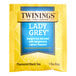 A yellow Twinings package of Lady Grey tea bags with a blue and yellow label.