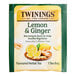 A green and white Twinings package of Lemon & Ginger tea bags.