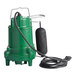 An Ashland green submersible sump pump with a black cord.