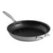 A close-up of a Vigor 14" stainless steel non-stick fry pan with a helper handle.