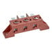 A red Moffat 3 pole terminal block with several holes.