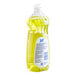 A close-up of a JoySuds bottle of yellow liquid with a label.