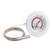 A Miljoco flush mount vapor dial thermometer with a white round face and a blue and red striped circle on it, with a wire attached.