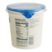 A Chobani Non-Fat Plain Greek Yogurt container with a blue lid.