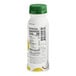 A close up of a white Chobani Pina Colada Greek yogurt drink bottle with a green cap and label.