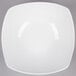 An American Metalcraft white square stoneware bowl with a white rim on a white background.