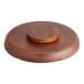 A Town carved wooden pu pu platter with 6 compartments on a round wooden plate.