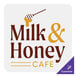 A white rounded corner vinyl sticker with a brown and white logo for Milk and Honey Cafe.