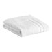 A folded white Lavex Luxury bath mat on a white background.