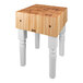A John Boos maple butcher block with white legs.