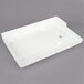 A white rectangular Nemco ShrimpPro feeder tray with holes.