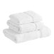 A stack of white Lavex Premium towels.