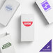 A set of customizable white paper bags with various printed logos and designs.