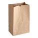 A brown paper bag with a crease.