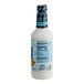 A white bottle of Zing Zang Pina Colada Mix with a blue label.