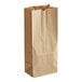 A brown paper bag with handles.