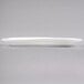 A close-up of a CAC Miami rectangular bone white porcelain platter.