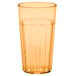 A clear plastic tumbler with an amber rim.