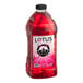 A bottle of Lotus Plant Power Skinny Sugar-Free Pink Lotus 5:1 Energy Concentrate, a pink liquid with a label.