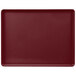 A red rectangular tray with a white border.