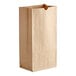 A close-up of a brown Choice Natural Kraft paper bag with a brown handle.