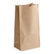 A close up of a brown Choice natural kraft paper bag.