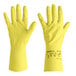 A pair of yellow Ansell AlphaTec natural latex rubber gloves with fish scale grip.