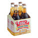 A yellow box with white writing containing 24 IBC Cream Soda 12 fl. oz. glass bottles.