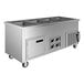 A Delfield stainless steel mobile food well service counter with three pans.