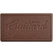 A brown rectangular Guittard chocolate bar with the word Guittard on it.