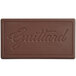 A brown Guittard rectangular chocolate bar with the word "Guittard" on it.