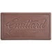 A white rectangular Guittard chocolate bar wrapper with brown text.