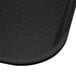 A close up of a black Carlisle fast food tray.