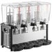 A black and white Carnival King refrigerated beverage dispenser with four clear containers.