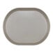 A white oval melamine platter with raised rims.