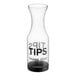 A clear plastic tip jar with a black lid and label.